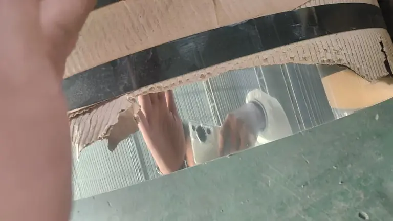 Inspector reflection test on mirror finish coil
